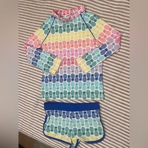 Mini Boden rainbow pineapple print rash guard and swim shorts set - size 6-7